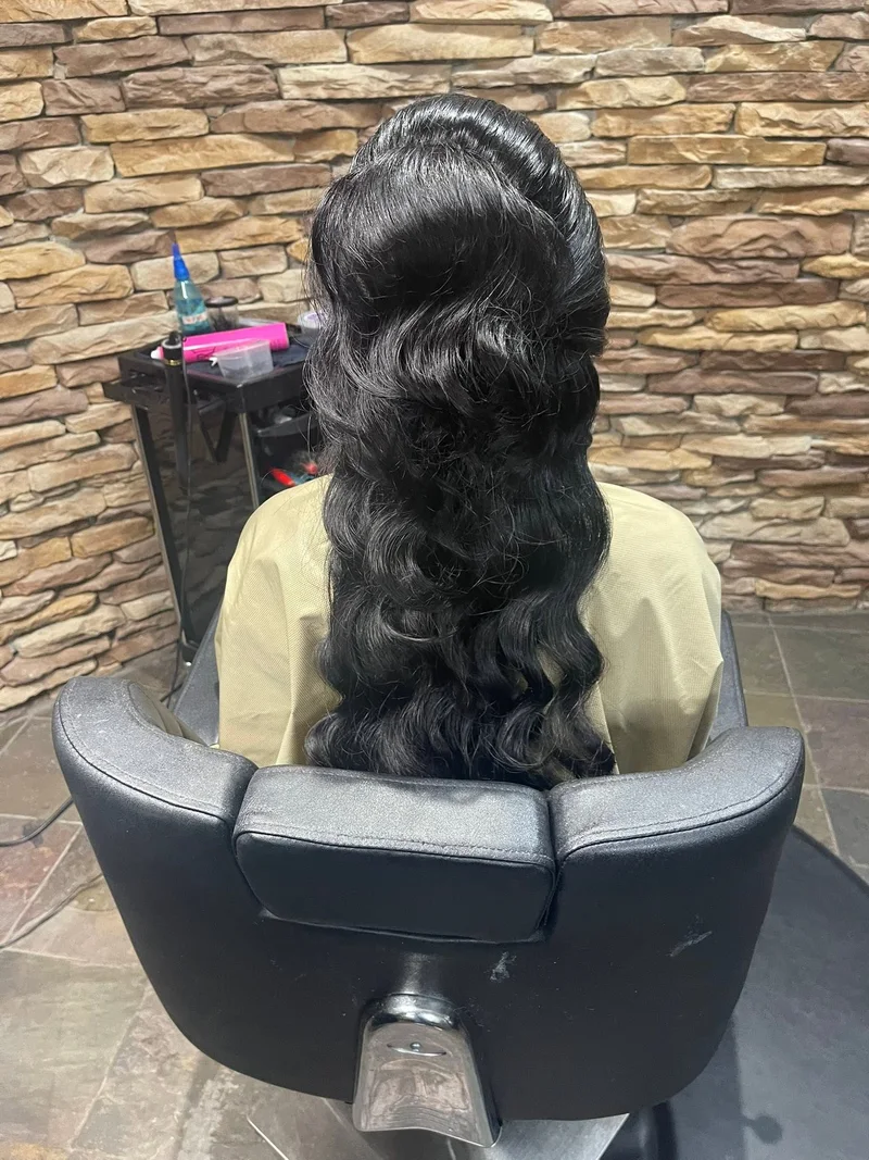Long dark hair styled in waves